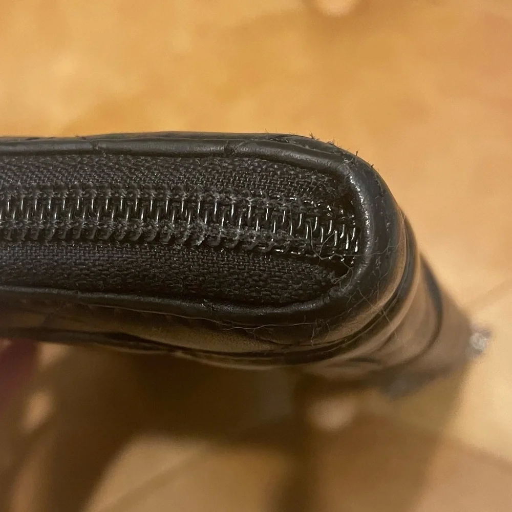 CHANEL Black Quilted CC Zip-Around Wristlet Clutch